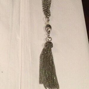 Long silver and pearl necklace with tassel